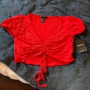 red cropped shirt